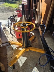 Hydraulic Transmission Jack with Adjustable Saddle Attachment Yellow Base